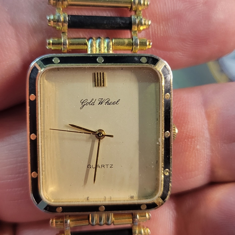 Y2K ladies watch with ladder chain style bracelet. GOLD WHEEL QUARTZ
